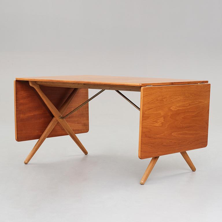 Hans J. Wegner, a teak and oak drop-leaf dining table, Andreas Tuck, Denmark 1950'-60's.