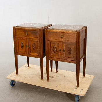 A pair of oak bedside tables beginning of the 20th century.