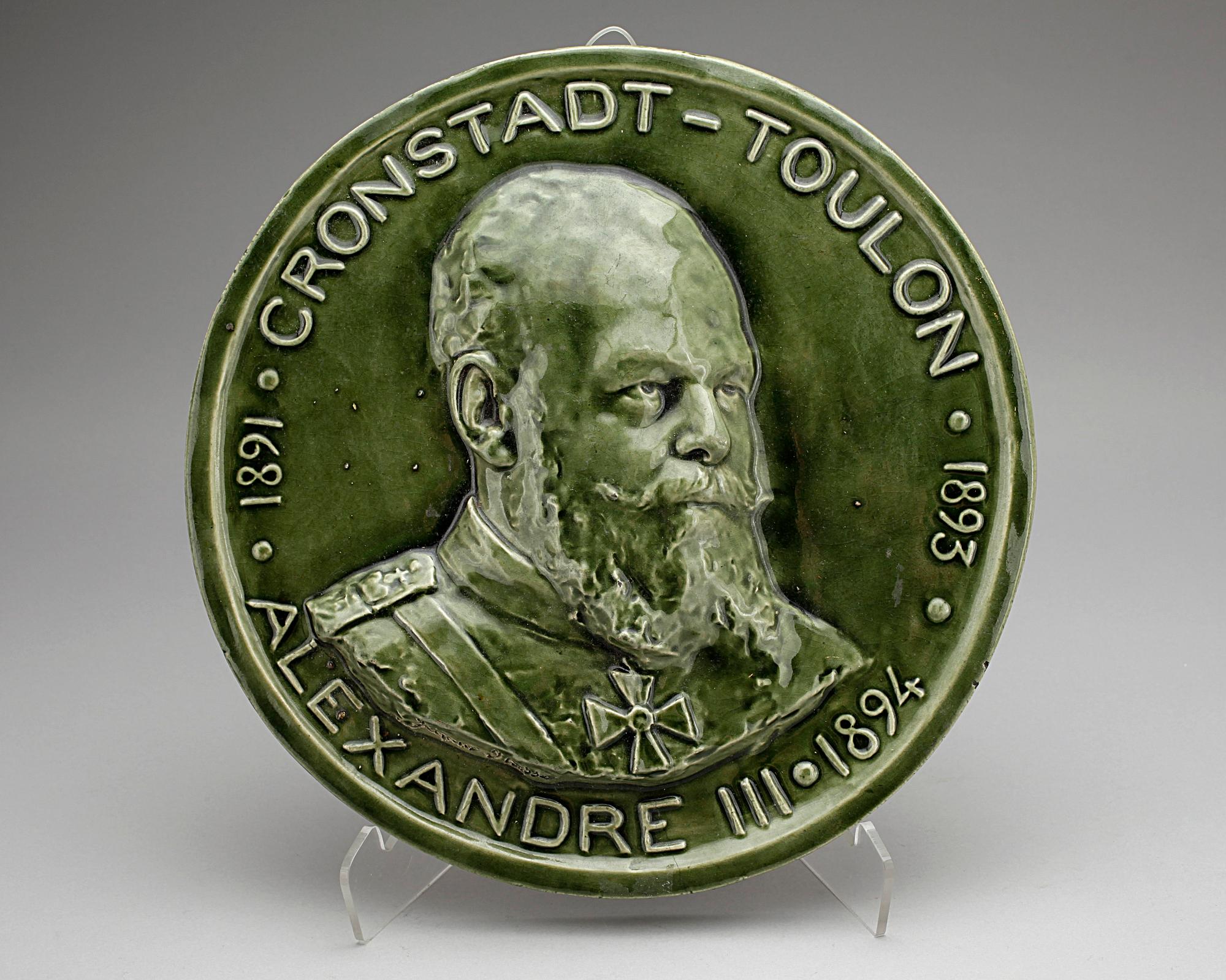 MEDALJONG, keramik. E.Muller, Paris.
