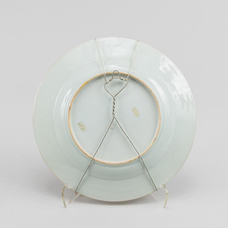 A famille rose dish and two dinner plates, Qing dynasty, Qianlong (1736-95).