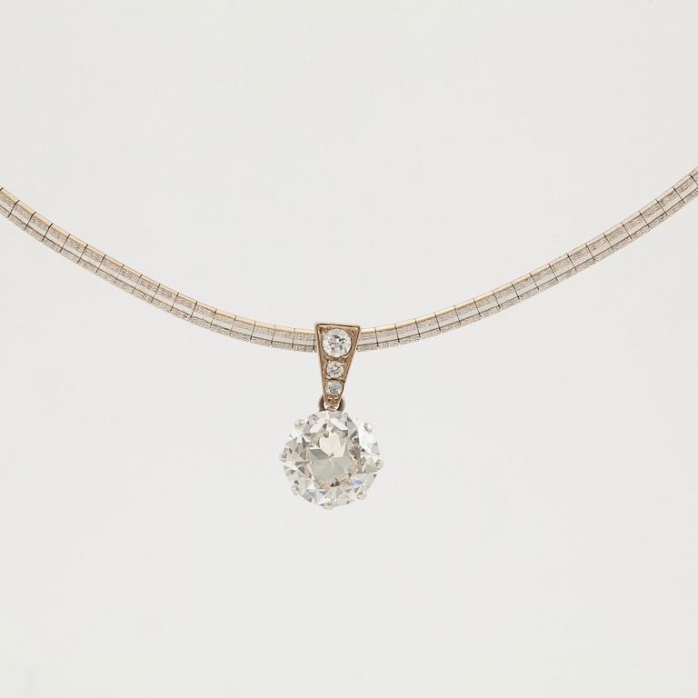 A platinum and 14K white gold pendant set with an old-cut diamond weight ca 3.00 cts quality ca K/L vs.