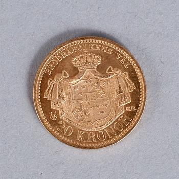 GULDMYNT, 20 kronor, Oscar II, 1879. Vikt ca 9 gram.