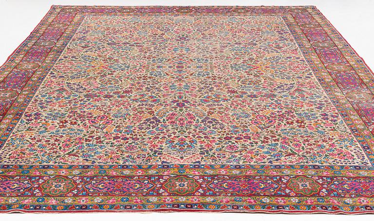 An antique 'Millefleur' Kerman Laver carpet, ca 434 x 321 cm.