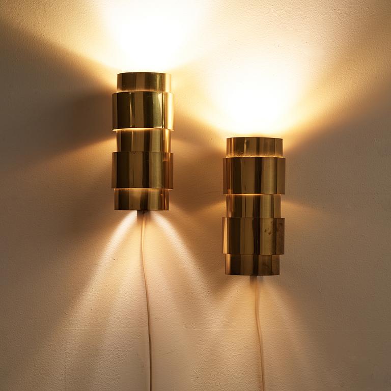 A pair of 'Aristokrat' brass wall lights, Fröseke AB Nybrofabriken, 1960's.