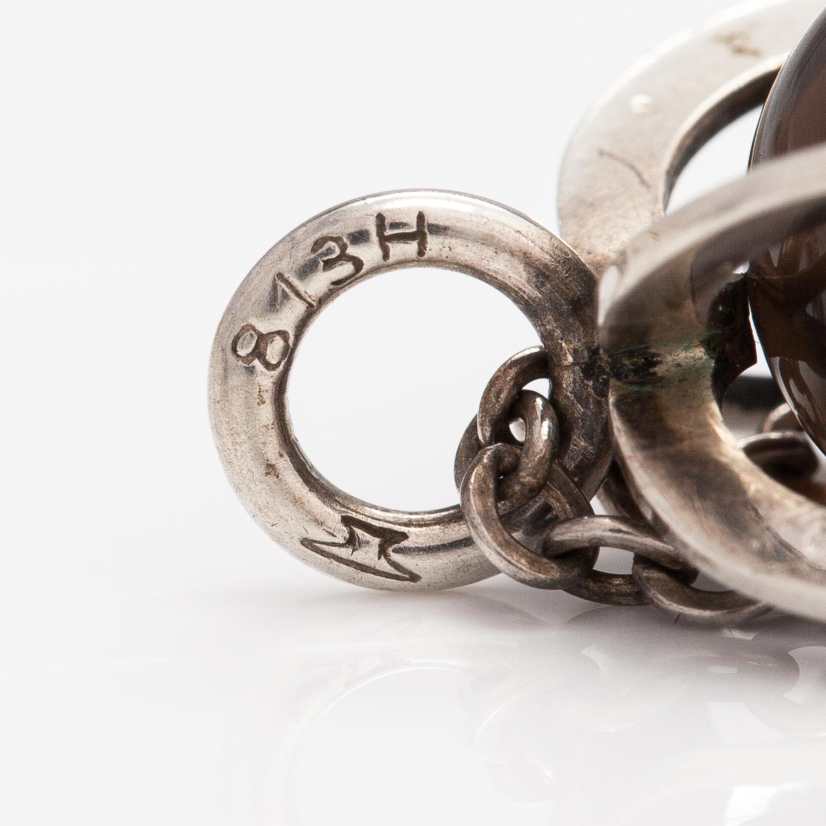 Elis Kauppi, A silver necklace with a smoaky quartz. Kupittaan kulta, Turku.