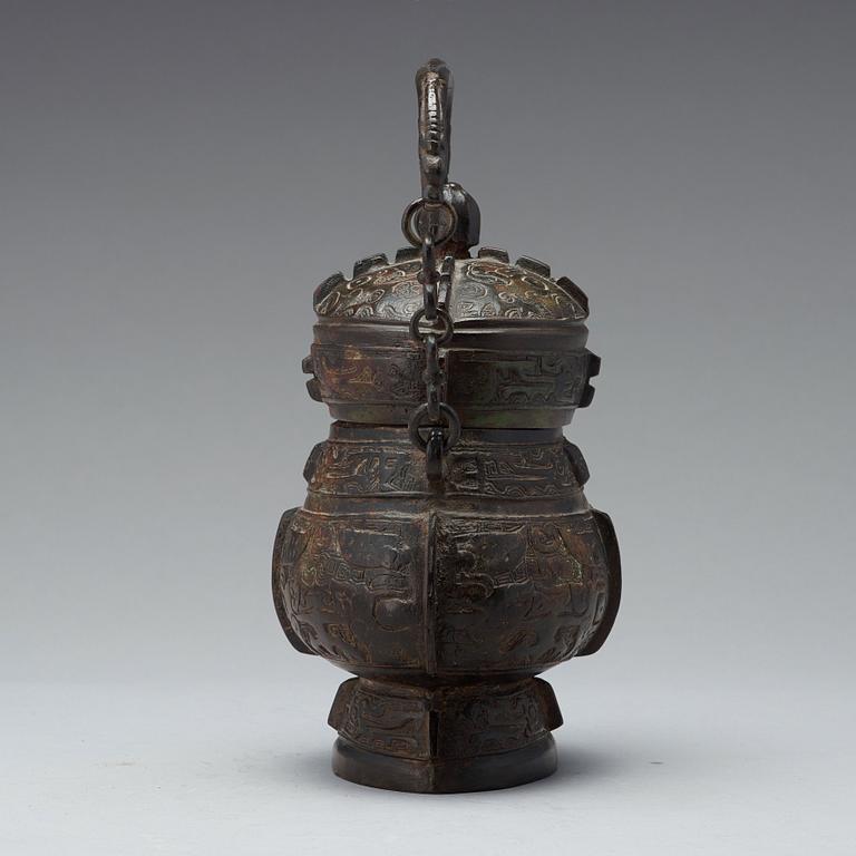 An archaistic bronze vessel of You shape, Ming dynasty or older.