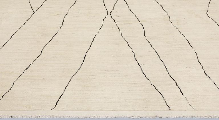 A Moroccan carpet, 335 x 258 cm.