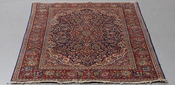 A rug, semi-antique Kashan, ca 204 x 138 cm.