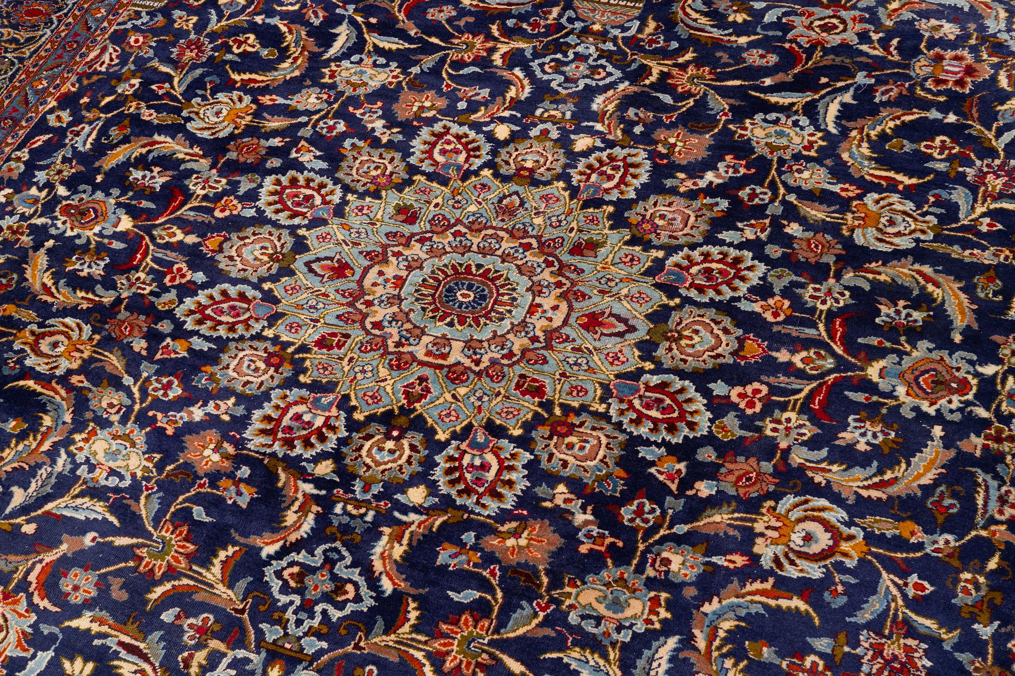 An oriental carpet, c. 390 x 295 cm.