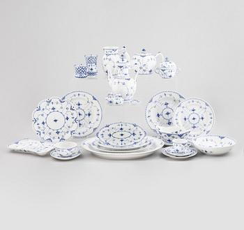 Royal Copenhagen, a 104-piece half lace 'blue fluted' porcelain dinner and coffee service, Denmark, 20th century.