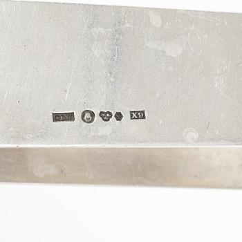 Four silver objects, 20th Century.