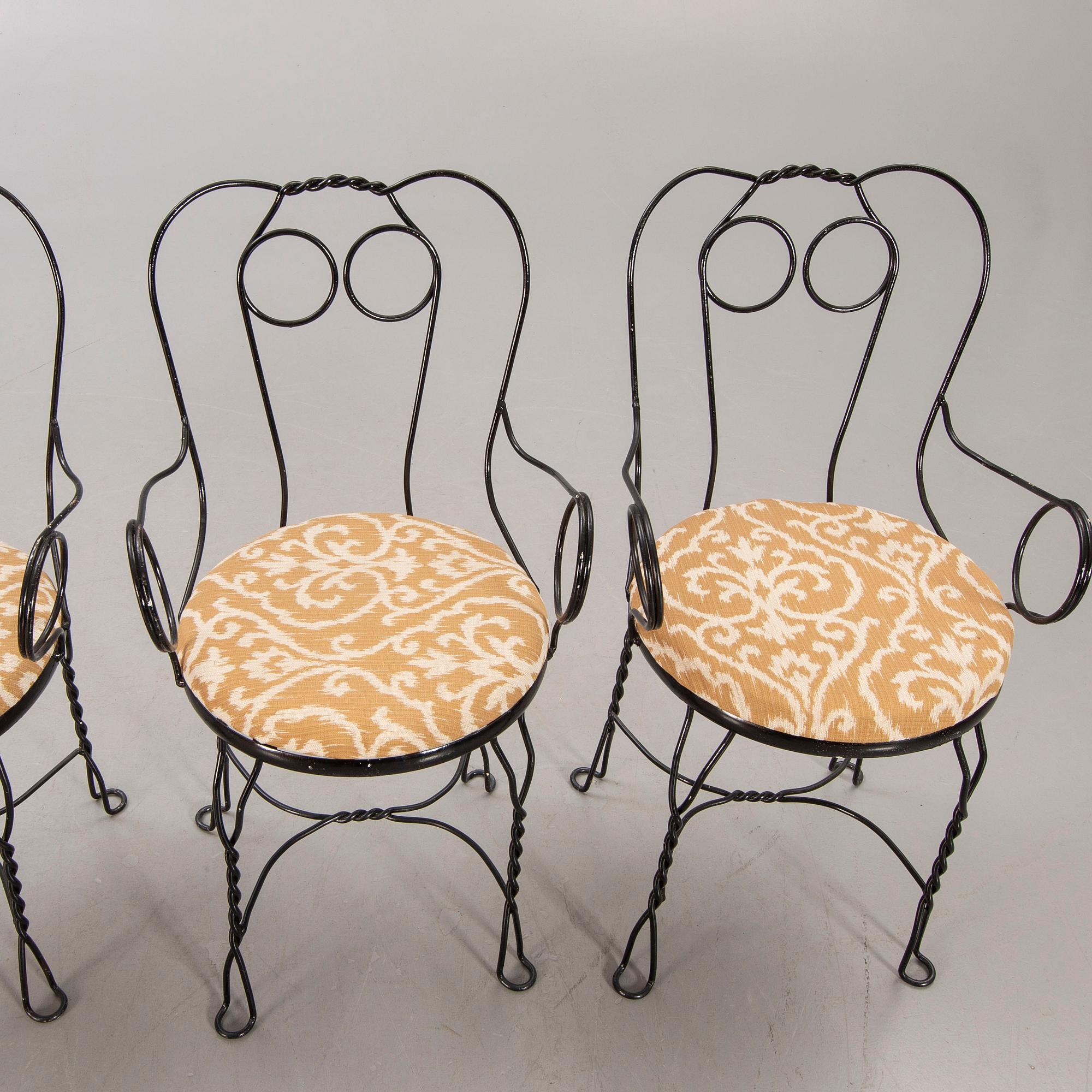 A set of four Grytgöl metal garden chairs mid 1900s.