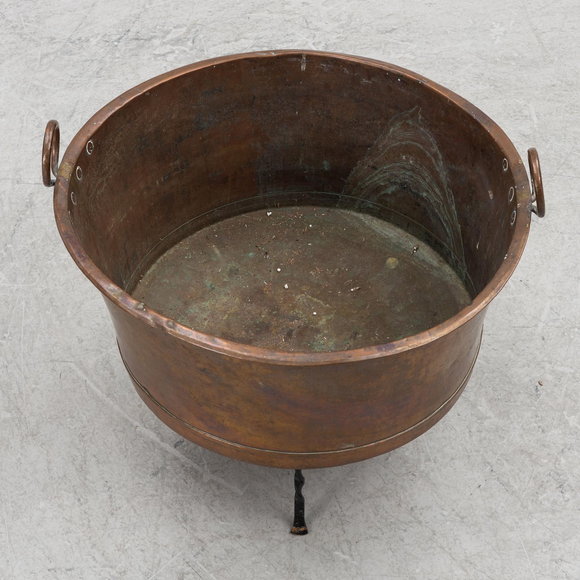 A 19th century copper tub.