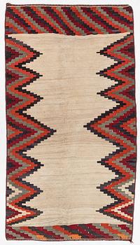 A semi-antique Qashqai kilim, c. 350 x 188 cm.