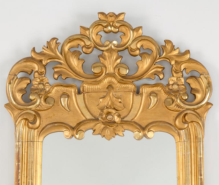 A late 19th century rococo style mirror.