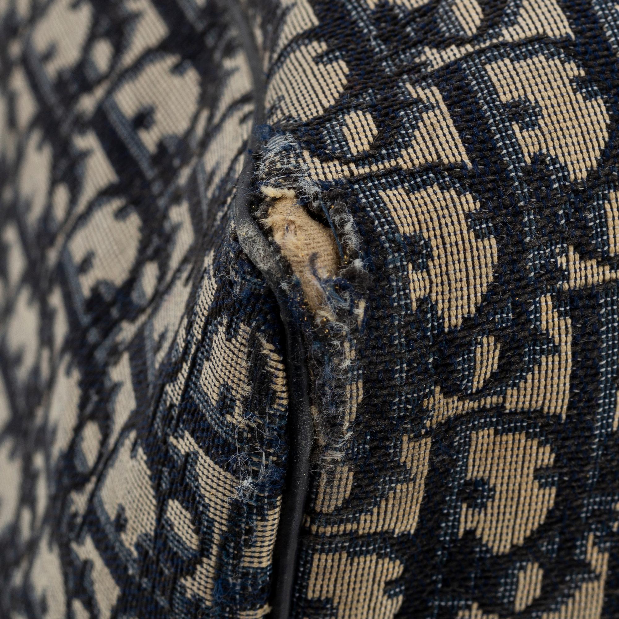 Christian Dior, a canvas 'Speedy' weekendbag and belt, size 85.