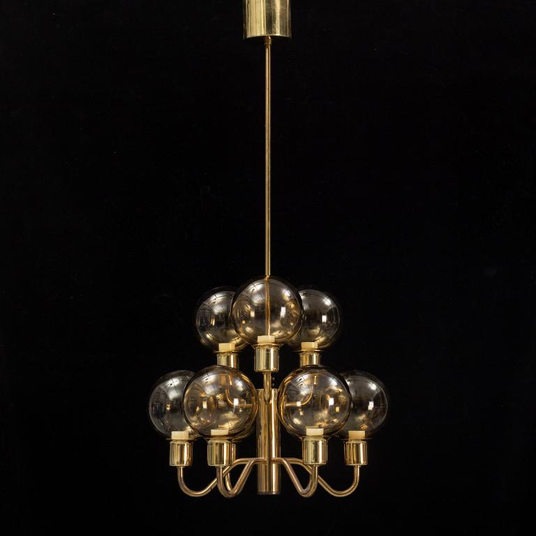 Hans-Agne Jakobsson, a late 20th century brass and glass ceiling lamp for nine lights, Markaryd, Sweden.