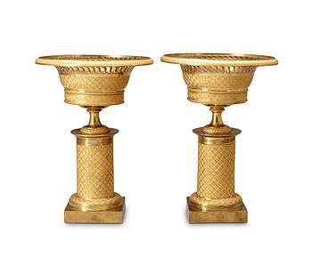 A pair of French Empire early 19th Century gilt bronze tazzas.