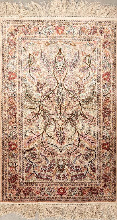 Oriental silk rug, approximately 122x77 cm.