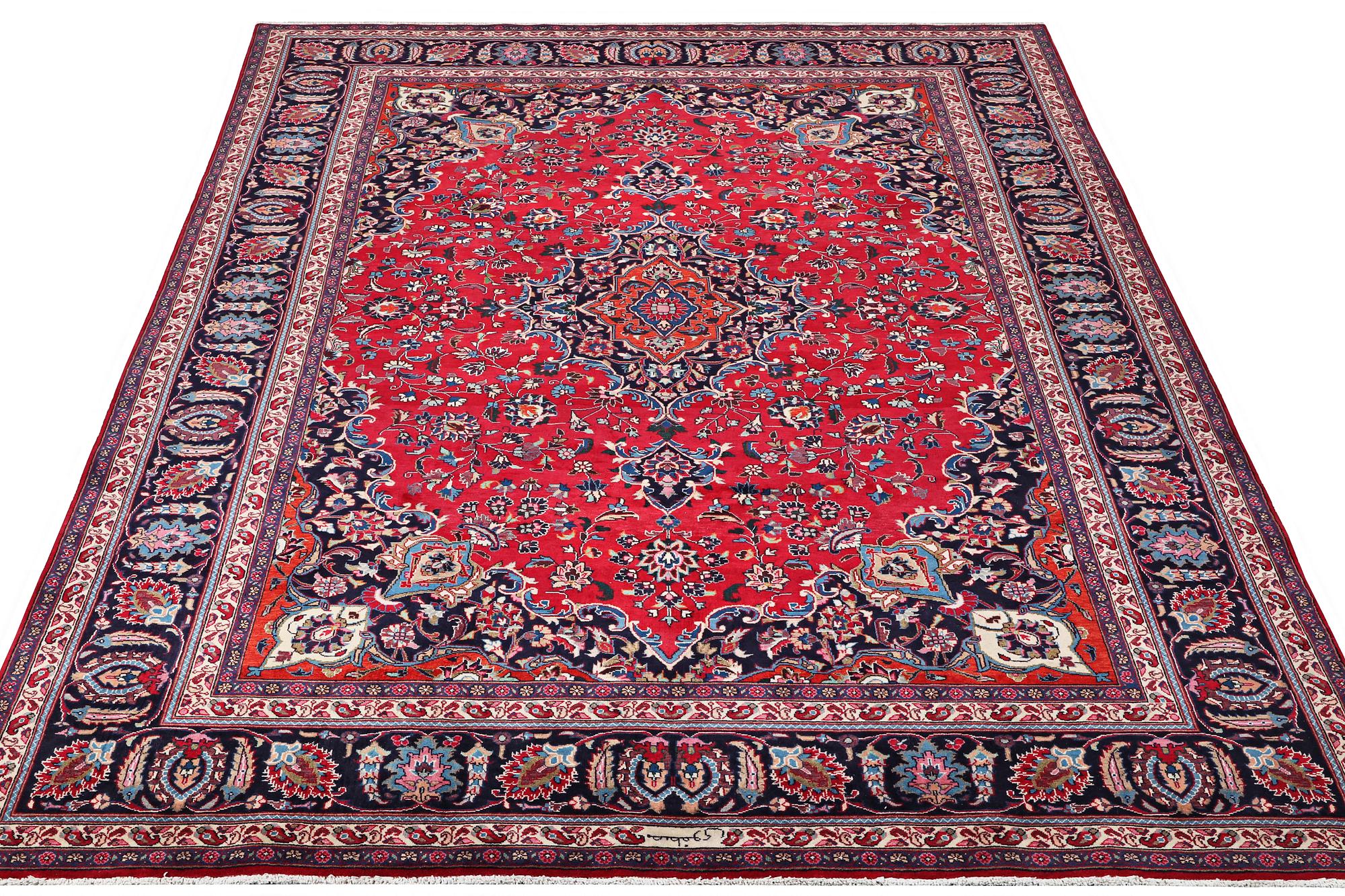 A Kashan carpet, c. 358 x 244 cm.