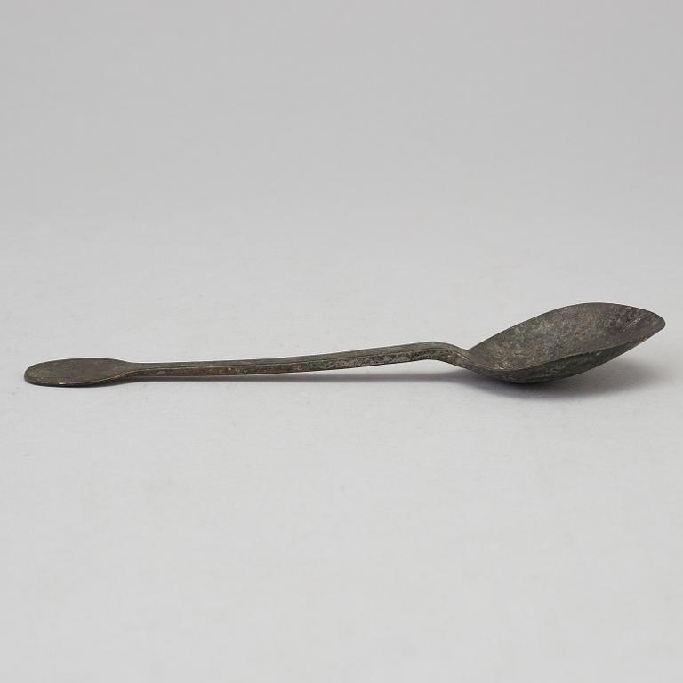 A BRONZE SPOON, possibly 16th/17th century.