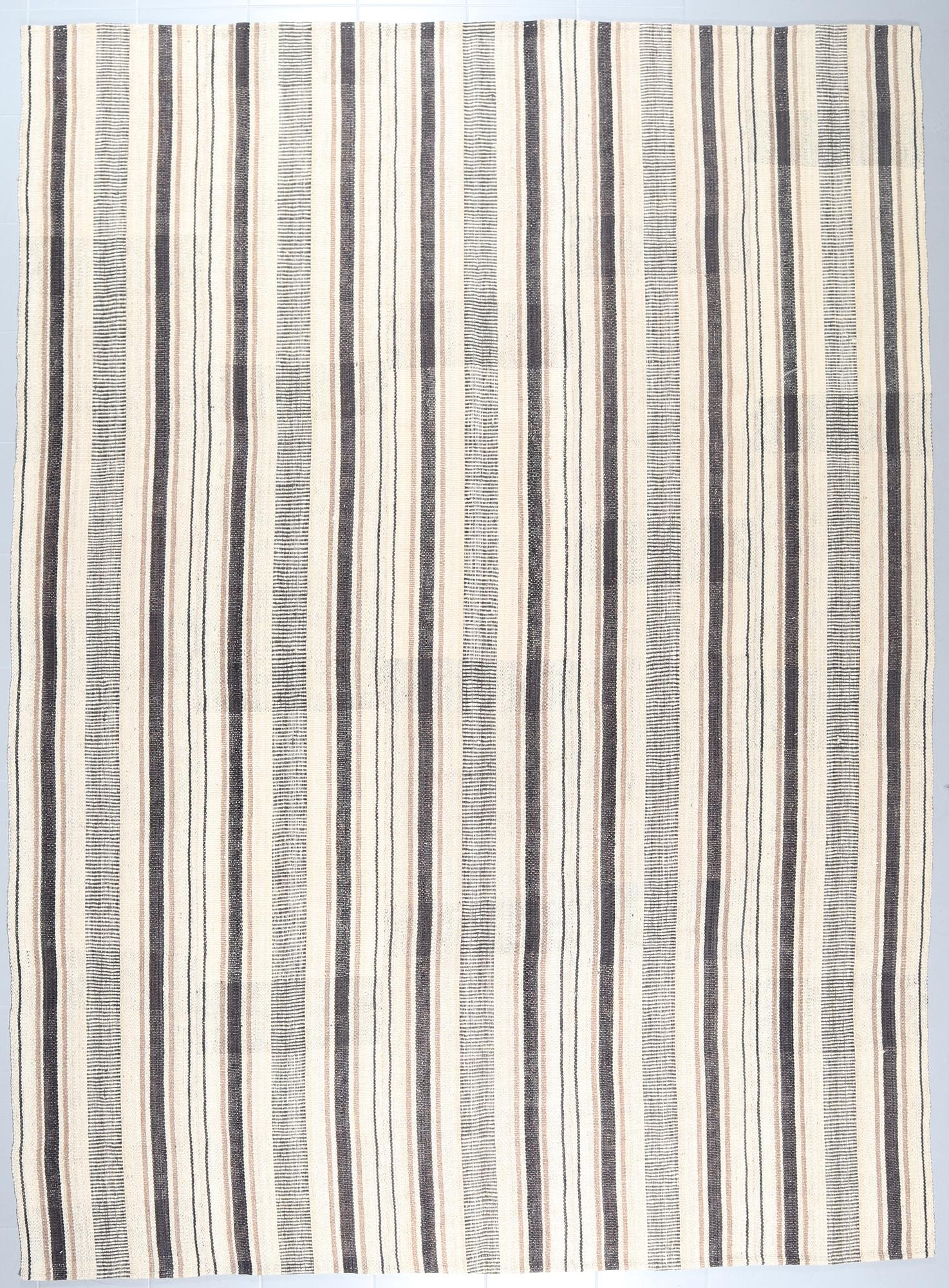 A FLATWEAVE RUG, 339 x 247 cm.