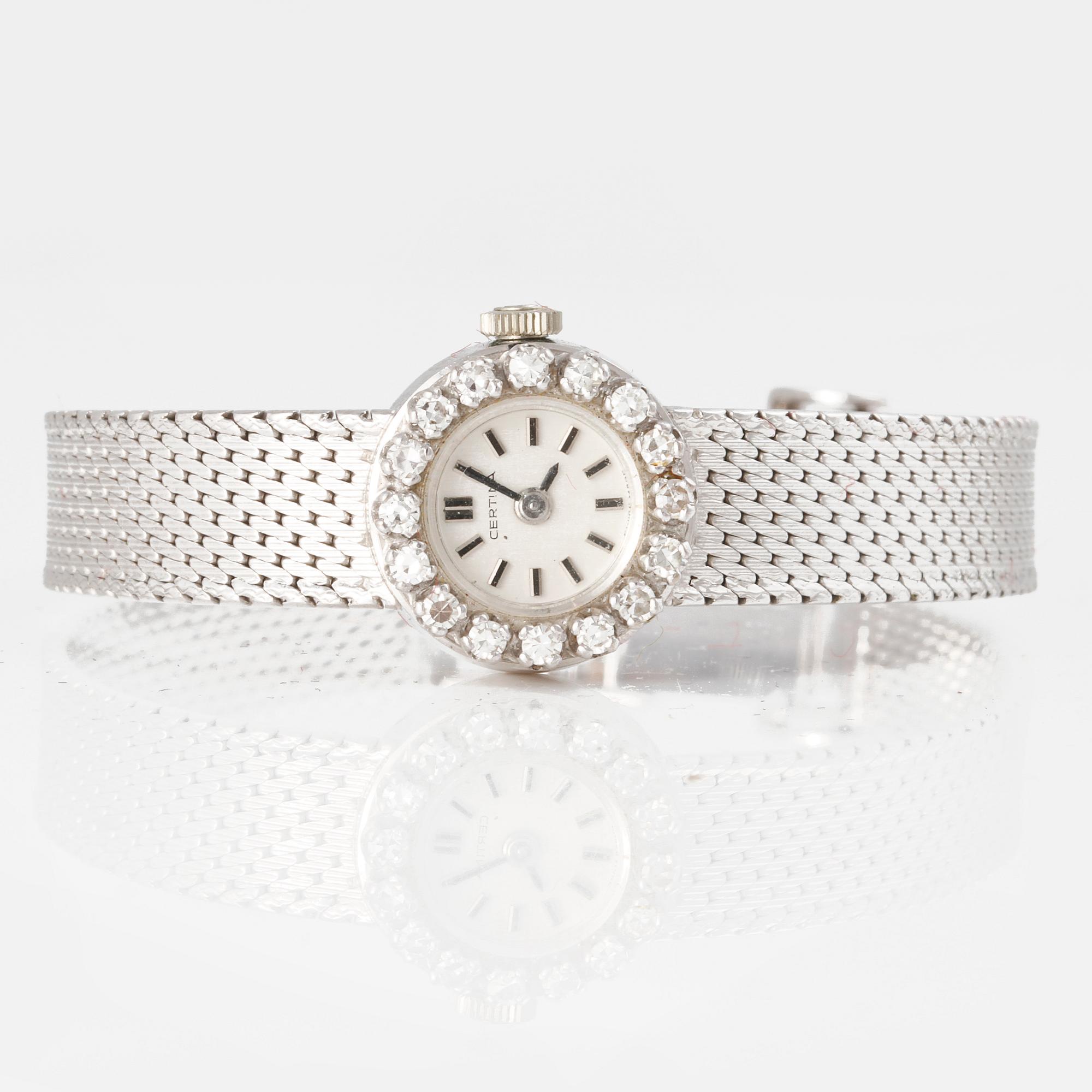 ARMBANDSUR, 18k vitguld, 16 briljantslipade diamanter, Certina, Schweiz, omkring 1900-talets mitt. Total vikt 26 g.