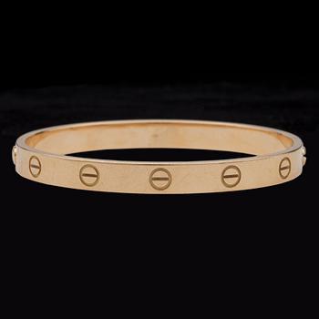 734. A Cartier gold 'Love bracelet'.
