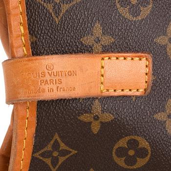 LOUIS VUITTON, a monogram canvas garment cover.