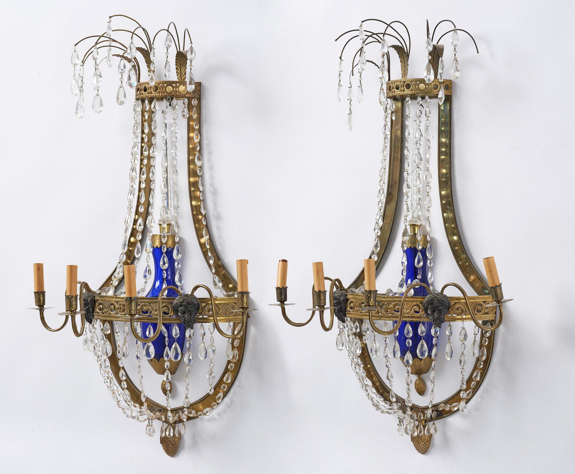 A pair of Russian Louis XVI-style  four-branch gilt bronze appliques, 19th century.