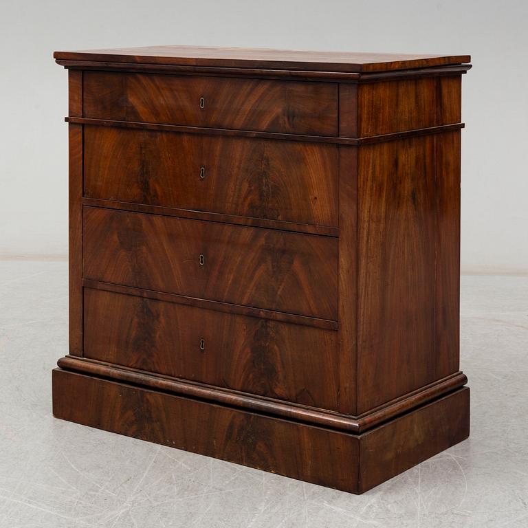 A northern european empire chest of drawers.