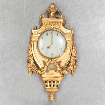 A Gustavian pendulum wall clock.