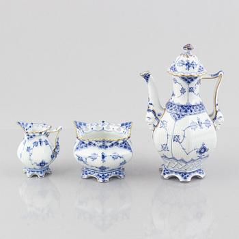 A 'Blue Fluted Full Lace' porcelain coffee pot, creamer and sugar bowl, Royal Copenhagen, 1030, 1031, 1112, 1950/60s,.