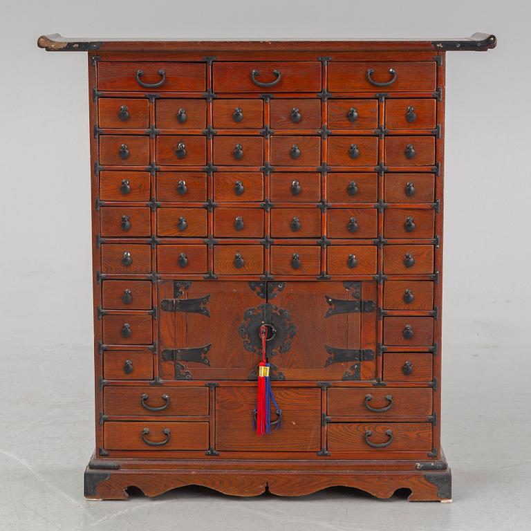 A contemporary Chinese spice cupboard.