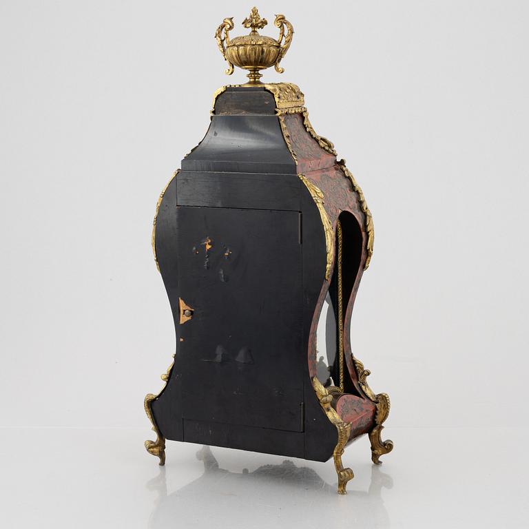 A Louis-XV style mantle clock, France, 19th century.