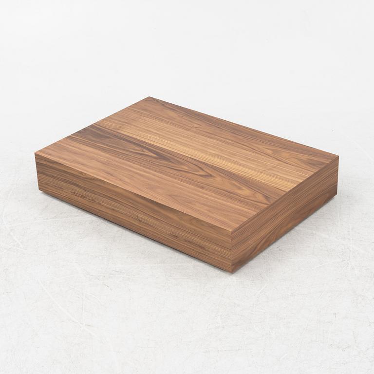 A 'Mass Wide' walnut veneered coffee table from New Works.