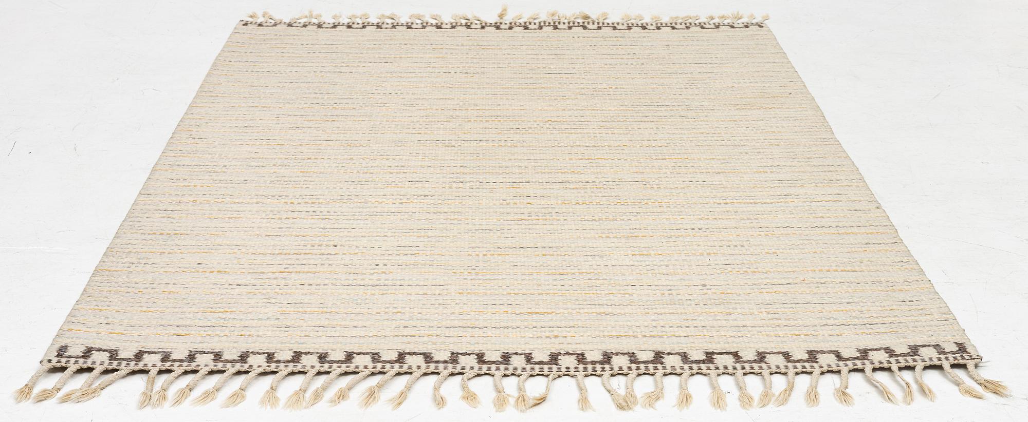 A  flat weave carpet, c. 202 x 137 cm.
