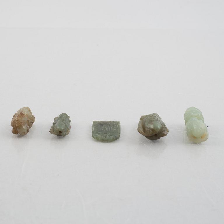 A group of five Chinese stone charms, 20th century.