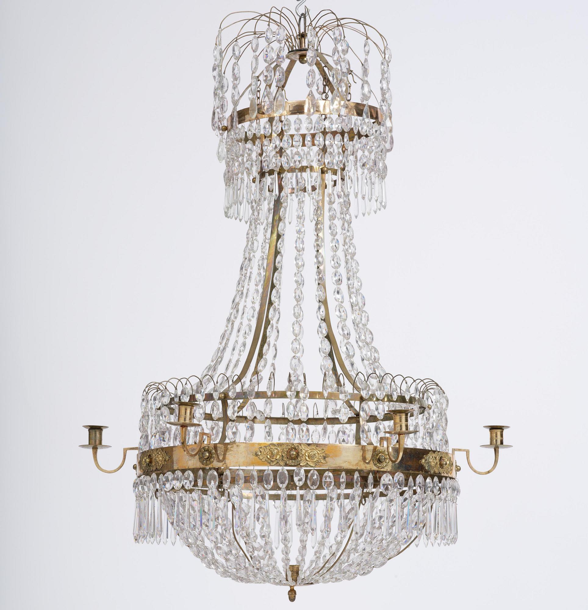 A late Gustavian gilt brass and cut glass seven-light chandelier, Stockholm late 18th century.
