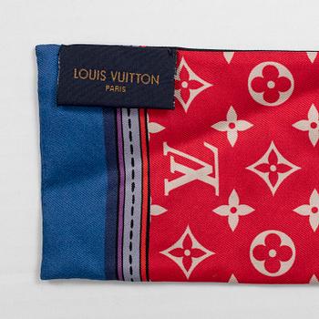 A Louis Vuitton silk monogram 'Superstition' bandeau scarf.