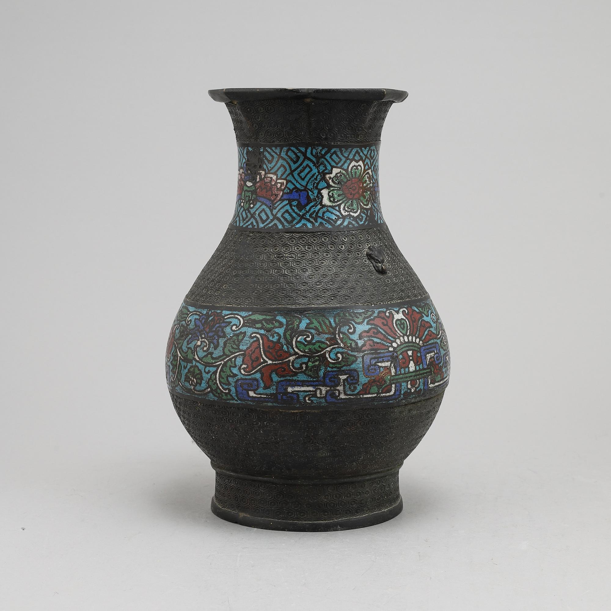 A Chinese bronze and cloisonné vase, around the year 1900.