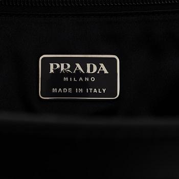 Prada, a black leather bag.