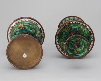 A pair of cloisonné candle sticks, 20th century.