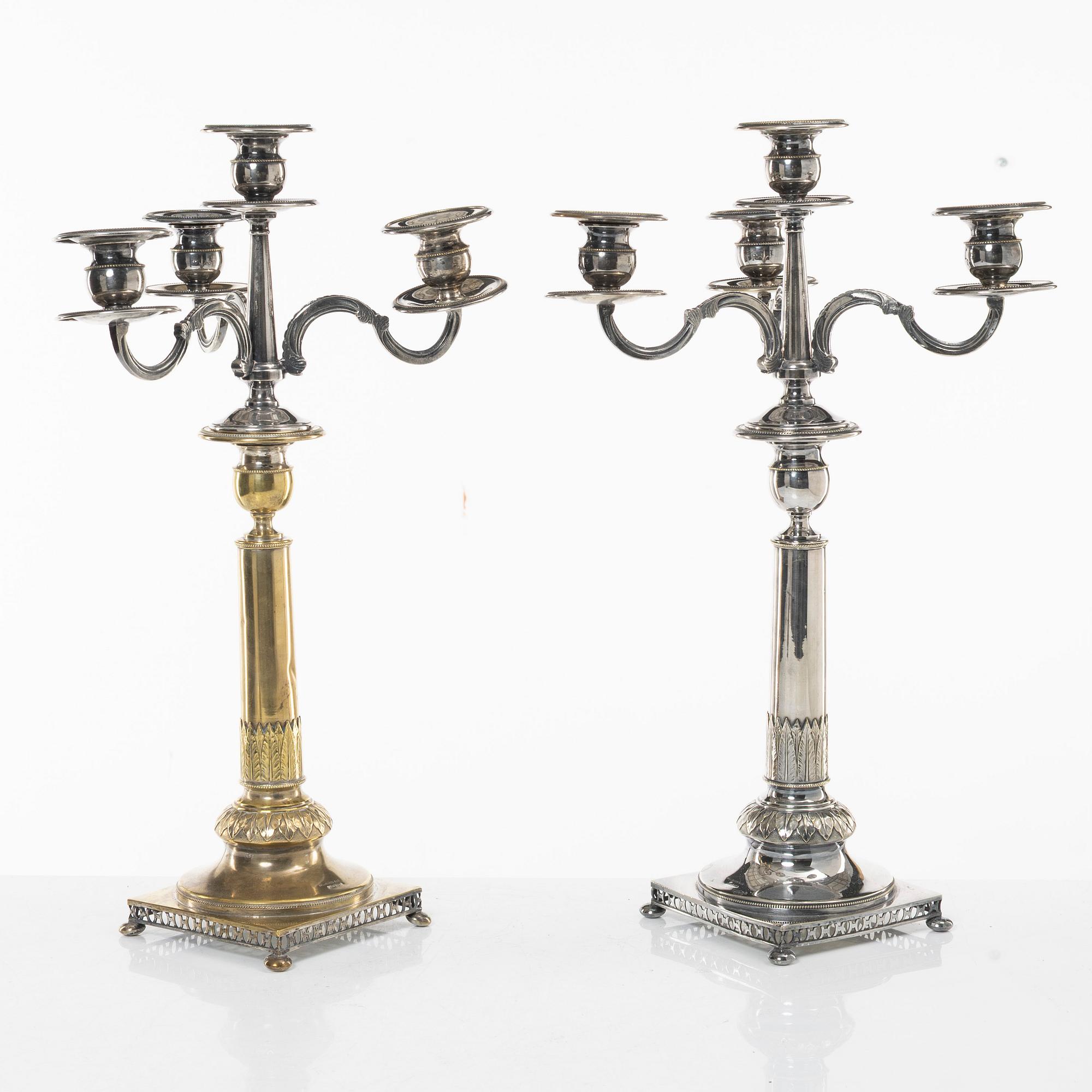 A pair of silver plated candelabra, CG Hallbergs Guldsmeds Ab, Stockholm, first half of the 20th century.