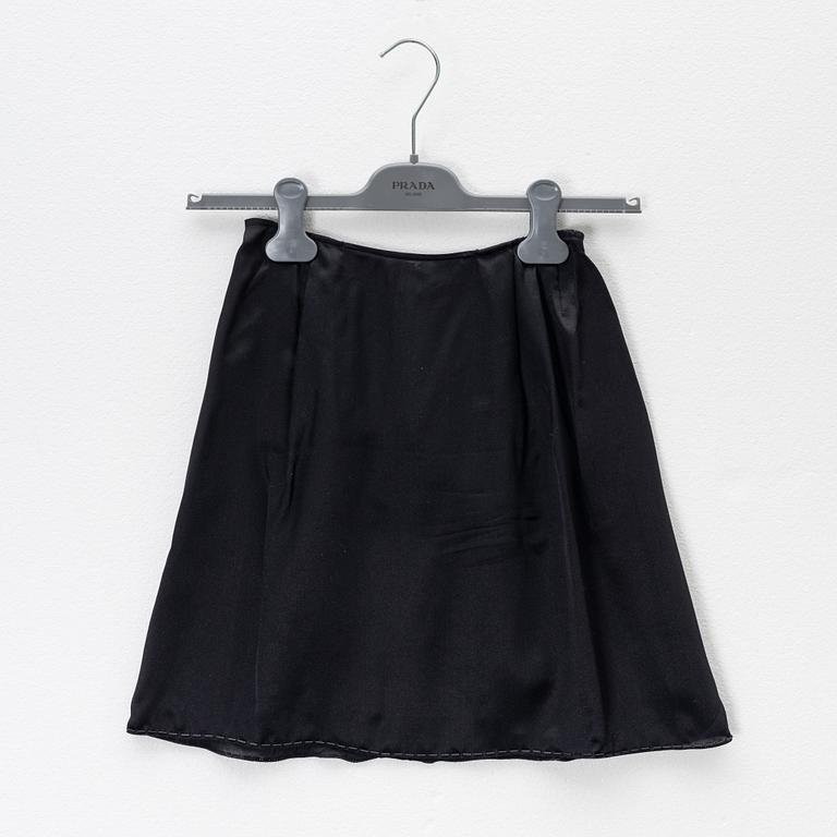 Prada, a set of a black silk top and skirt, size 42.