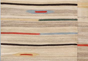 An oriental flat weave carpet, c 315 x 222 cm.
