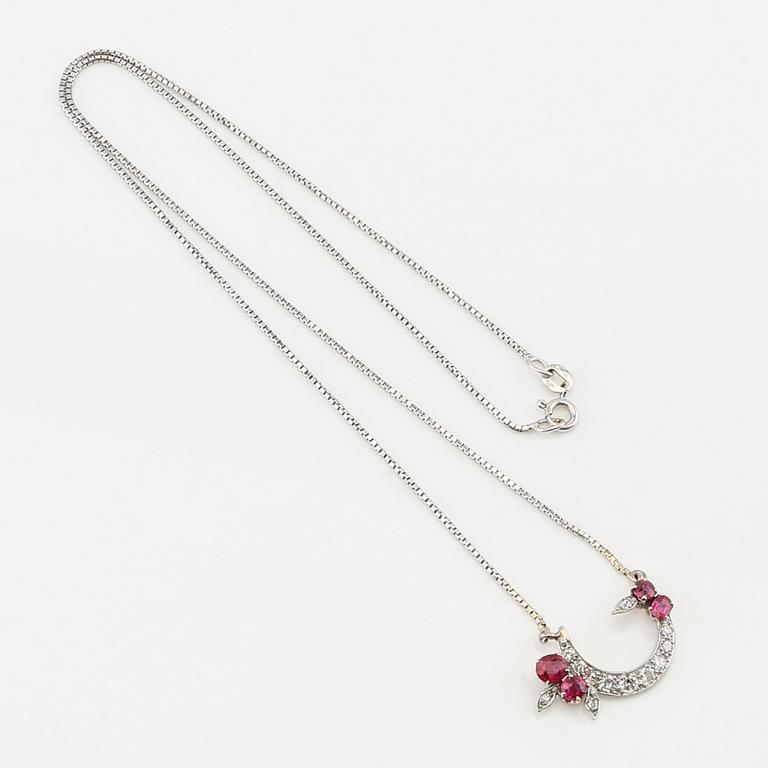 Necklace 18K white gold with faceted rubies and diamonds.