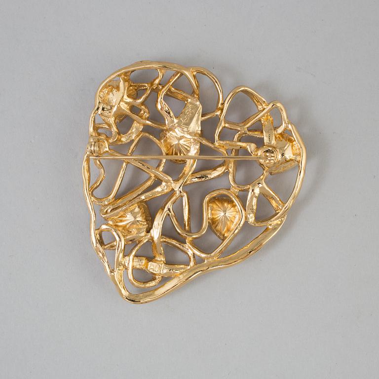 BROSCH, Yves Saint Laurent.