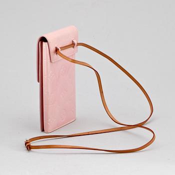 A pink monogram vernis purse by Louis Vuitton.