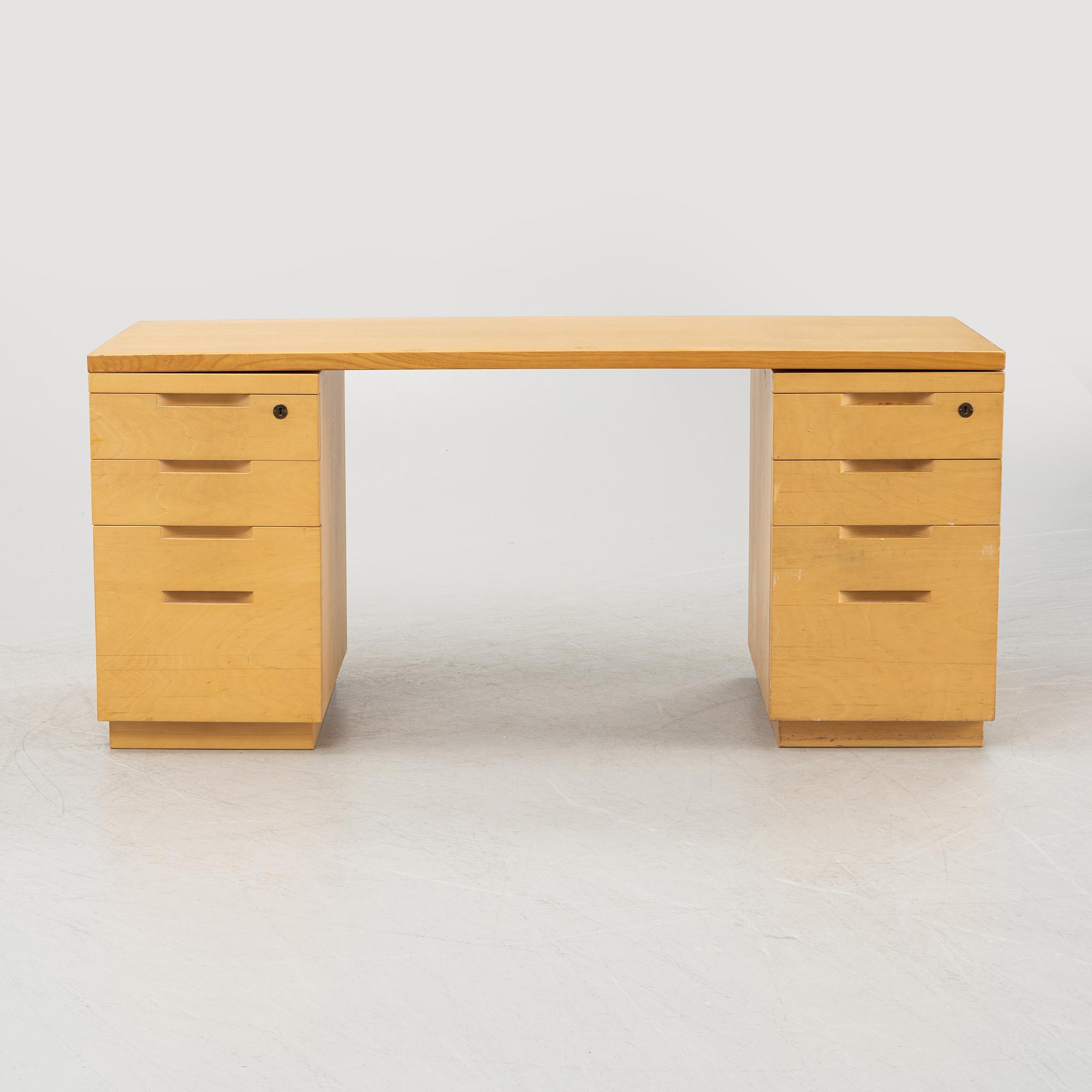 Alvar Aalto, a birch writing desk for Artek, Finland, second half of the 20th century.